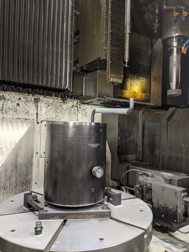 Positrol workholding fixture inside a vertical grinding machine